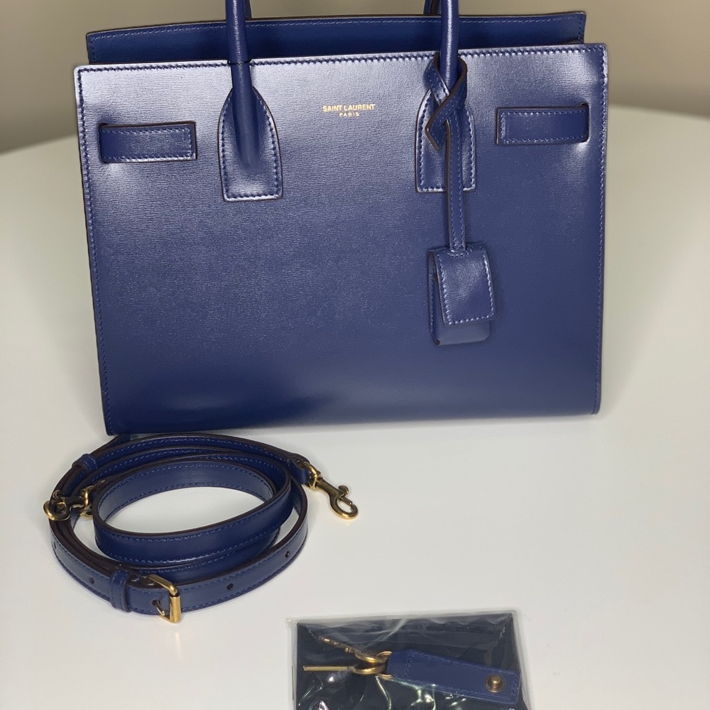 Brand new blue saint laurent baby sac du jour.